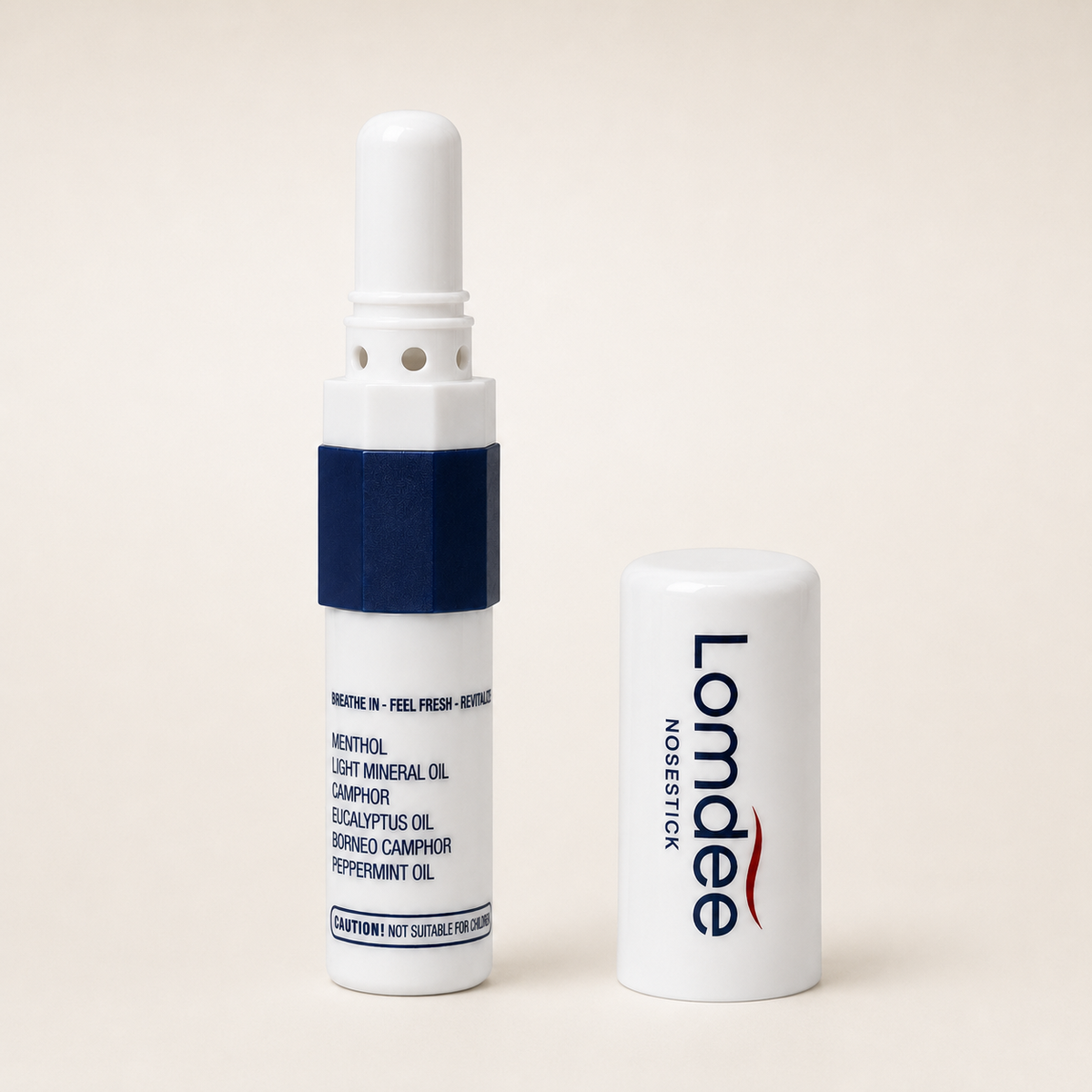 Geöffneter Lomdee Nosestick mit abgenommenem Verschluss daneben